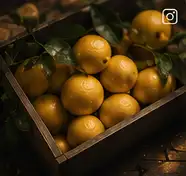 A wooden crate filled with lemons